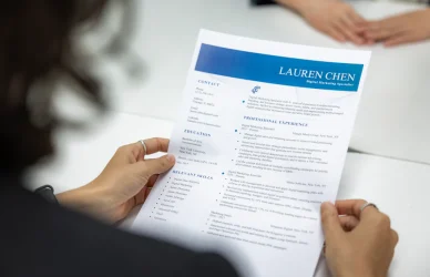 Kenyan job seekers using laptops and smartphones to search for jobs online to explore Kenya Job Market.